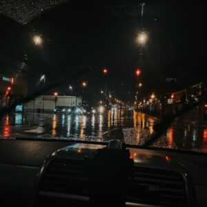 Picture from a car of one of Chicago neighborhoods while it is raining; 10 Fun Things to Do When It's Raining in Chicago – Women's Chicago, Illinois Travel Guide – Jazmin Marie Women's Lifestyle and Travel Blog – Best Chicago Women's Travel Blog - Chicago, Illinois